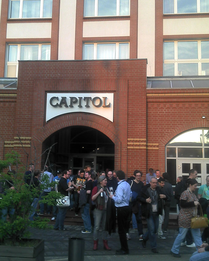 people standing in front of the conference venue